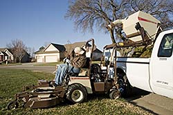 Grounds Equipment Attachment Allows for Easy Emptying of Clippings, Debris: Grasshopper Co.