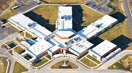Seam-Welded Membrane can be Adhered or Attached Mechanically: Flex Roofing Systems