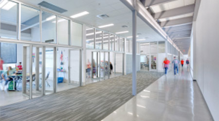 Facilities Management News Folding Glass Wall Modernizes