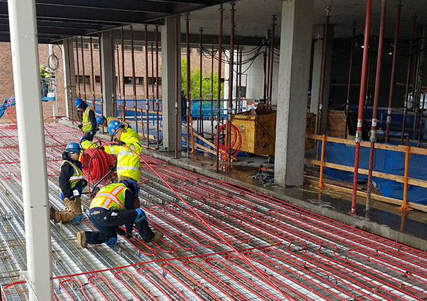 Radiant heating/cooling piping being installed at University of Washington Life Sciences Building