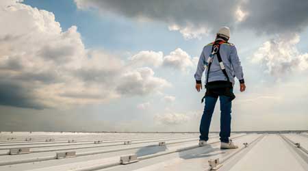 worker on roof